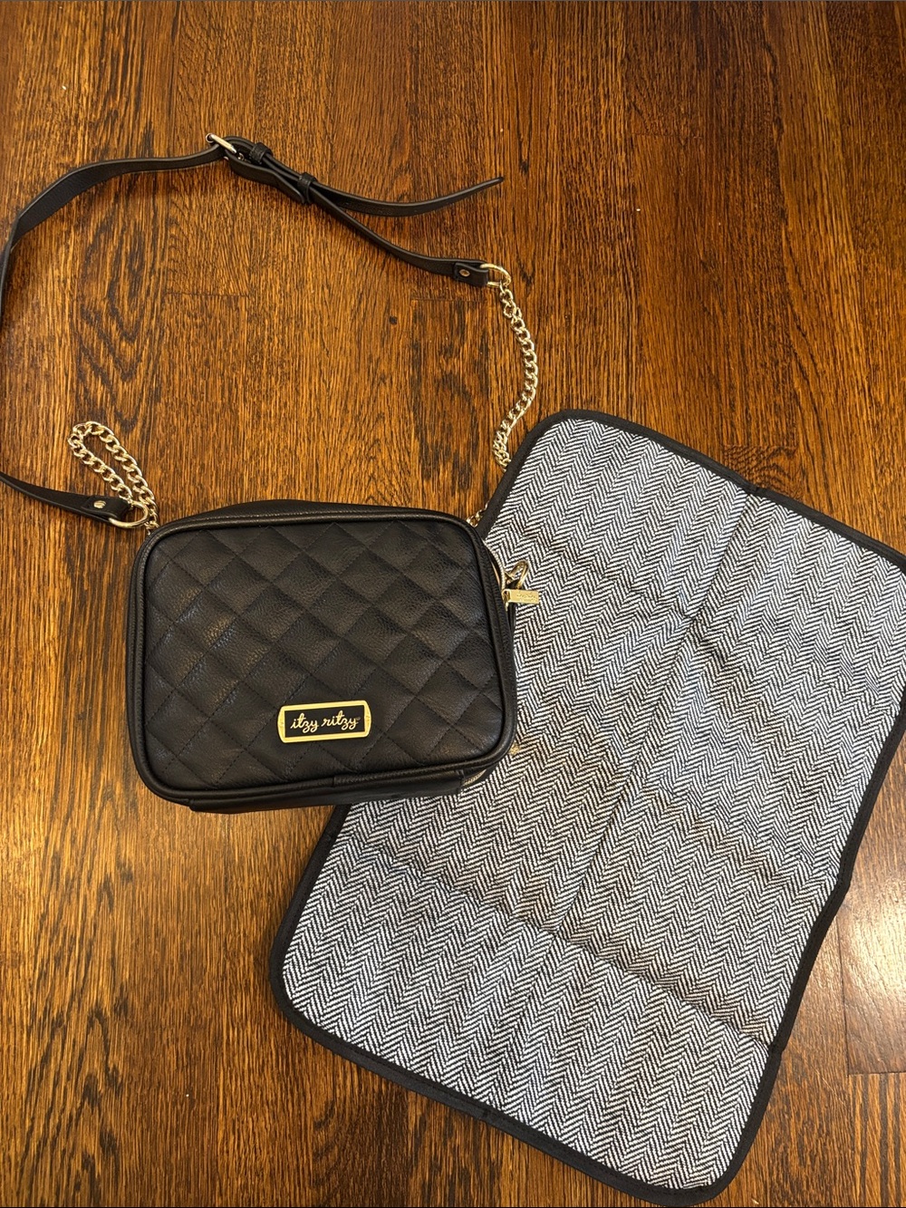 Itzy ritzy crossbody diaper bag with Gold Hardware with changing pad